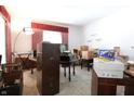 Bright living room featuring natural light and ample space at 633 N East St, Greenfield, IN 46140