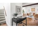 Bright living room featuring hardwood floors and an open concept design at 3936 Graceland Ave, Indianapolis, IN 46208