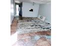 View of an open living space needing new flooring and some TLC at 4235 Foxglove Trce, Indianapolis, IN 46237