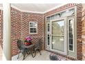 Charming porch area, perfect for relaxing with outdoor seating at 6656 Easy St, Fishers, IN 46038