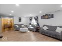 Spacious living room with wood floors, recessed lighting, and elegant furnishings at 951 Curlew Ln, Greenwood, IN 46143