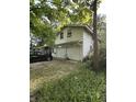 A detached two car garage located at the rear of the property at 9550 N Delaware St, Indianapolis, IN 46240
