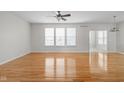 Spacious living room with hardwood floors and plenty of natural light at 13019 Pinner Ave, Fishers, IN 46037