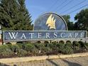 Waterscape community sign surrounded by lush landscaping at 20876 Waterscape Way, Noblesville, IN 46062
