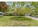 Well-maintained ranch home showcasing lush lawn and landscaping at 2315 Elm Swamp Rd, Lebanon, IN 46052