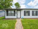 Charming single-story home featuring a well-maintained lawn and a welcoming front door at 3101 Gerrard Ave, Indianapolis, IN 46224