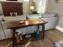 Cozy living room featuring a side table, lamps, and a comfortable sofa at 4130 Rookwood Ave, Indianapolis, IN 46208