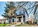 Charming two-story home with a landscaped yard and inviting porch at 430 N Keystone Ave, Indianapolis, IN 46201