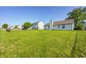 Expansive backyard with lush green lawn, perfect for outdoor activities and relaxation at 431 Alton Dr, Greenwood, IN 46143