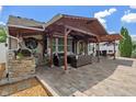 Spacious backyard patio with comfortable seating, perfect for outdoor entertaining at 10758 Cyrus Dr, Indianapolis, IN 46231
