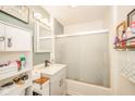 Cozy bathroom featuring a vanity with a sink, updated fixtures, and a framed mirror, all enhanced by modern lighting at 2113 W Barcelona Dr, Muncie, IN 47304