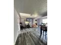Inviting living room with modern flooring and a bright, open atmosphere at 2826 Falcon Dr, Indianapolis, IN 46222