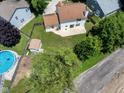Aerial view shows fenced-in yard, shed, and pool at 901 Mallory Pkwy, Franklin, IN 46131