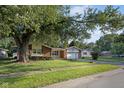 Well maintained home with a large tree in the front yard at 911 Glendale Dr, Lebanon, IN 46052