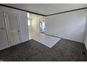 A bright living room with carpet, perfect for relaxation and entertainment at 1201 E Gimber St, Indianapolis, IN 46203