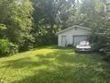 Detached garage and yard offering ample space and possibilities at 3429 Kinnear Ave, Indianapolis, IN 46218