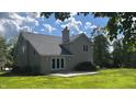 Beautiful home exterior featuring a spacious backyard and a private outdoor patio space at 4770 Winterberry Pl, Columbus, IN 47201