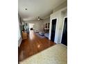 Spacious living room with hardwood floors, neutral walls, and vaulted ceilings at 8323 Lake Tree Ln, Indianapolis, IN 46217