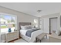 Comfortable bedroom with a cozy bed, neutral tones, and ample natural light at 920 State St, Shelbyville, IN 46176