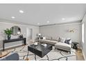 Inviting living room featuring a large sectional sofa and modern decor at 920 State St, Shelbyville, IN 46176