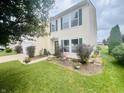 Attractive two-story home with a well-manicured lawn and established shrubbery at 2292 Hampton Dr, Franklin, IN 46131