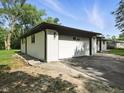 Spacious two-car garage with ample parking space and a well-maintained driveway at 2853 S State Ave, Indianapolis, IN 46203