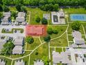 Aerial view showcases this home in its green neighborhood setting, highlighted in red at 5965 Deerwood Ct, Indianapolis, IN 46254