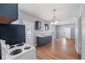 Modern kitchen features updated appliances, sleek countertops, and ample storage space at 615 Udell St, Indianapolis, IN 46208