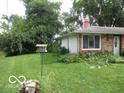 Charming single-story home with brick accents and a cozy, inviting curb appeal at 2610 Marywood Dr, Southport, IN 46227