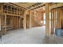 Spacious unfinished living area highlighting the layout and potential design elements at 7843 E Triple Crown Ln, Camby, IN 46113