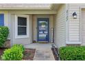 Close up of the home's front door entrance, showcasing welcoming decor and beautiful exterior details at 2127 Yosemite Dr, Lebanon, IN 46052
