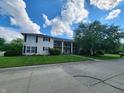 Exterior view of a two story apartment building and lawn at 4501 N Wheeling Ave # 5E4, Muncie, IN 47304