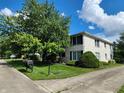Exterior view of a two story apartment building and lawn at 4501 N Wheeling Ave # 5E4, Muncie, IN 47304