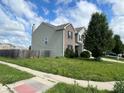 Street view of two story home with brick and vinyl siding, lawn, and street access at 7532 Gold Rush Ct, Camby, IN 46113