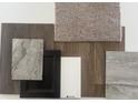 Interior design materials include wood flooring, carpet samples, cabinet, and countertop samples at 1073 E Valley Oak Ct, Mooresville, IN 46158