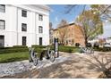 Charming street view features bike racks in front of well-maintained buildings and lush greenery at 12838 Bird Cage, Carmel, IN 46032