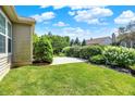 Spacious backyard with mature trees and landscaping, offering a serene outdoor retreat at 16130 Matlock Cir, Westfield, IN 46074