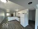 Modern kitchen with granite countertops and stainless-steel appliances at 2914 Baltimore Ave, Indianapolis, IN 46218
