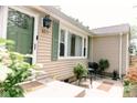 Inviting home with a front door, with a small table and chairs near a window at 6379 Monitor Dr, Indianapolis, IN 46220