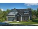 Charming home with grey shingles, stone accents, and a two-car garage at 14565 Bedford Falls Dr, Carmel, IN 46032