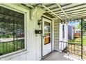 Front porch features a window, mail box, lighting, and door with glass panel at 2029 N Colorado Ave, Indianapolis, IN 46218