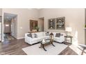 Bright living room features modern decor, high ceilings, and stylish furnishings at 2057 Abbey Ln, Columbus, IN 47201