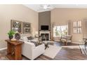 Spacious living room with a fireplace, tall ceilings, and lots of natural light at 2057 Abbey Ln, Columbus, IN 47201