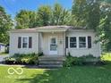 Charming single-story home with a well-maintained lawn and tidy landscaping at 249 Ohio St, Franklin, IN 46131