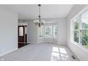 Bright dining room offering tons of natural light and hardwood floors at 4150 Huntsman Dr, Zionsville, IN 46077