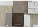 Image showcasing various material and color selections including flooring, cabinets, and tile at 9148 Anthem Ave, Plainfield, IN 46168