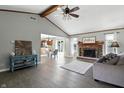 Open living area with vaulted ceilings connecting to an eat-in kitchen at 1011 Stevedon Ct, Plainfield, IN 46168