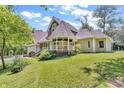 The home has a covered gazebo with seating and lots of green space at 940 S County Road 200 W, Danville, IN 46122