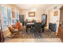Dining room with tile floors, a decorative rug, and seating for 6 at 1266 Hamilton Dr, Greenwood, IN 46143