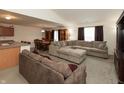 Comfortable living area with multiple couches connected to the kitchen and dining, perfect for entertaining guests at 2458 Bristol Dr, Franklin, IN 46131